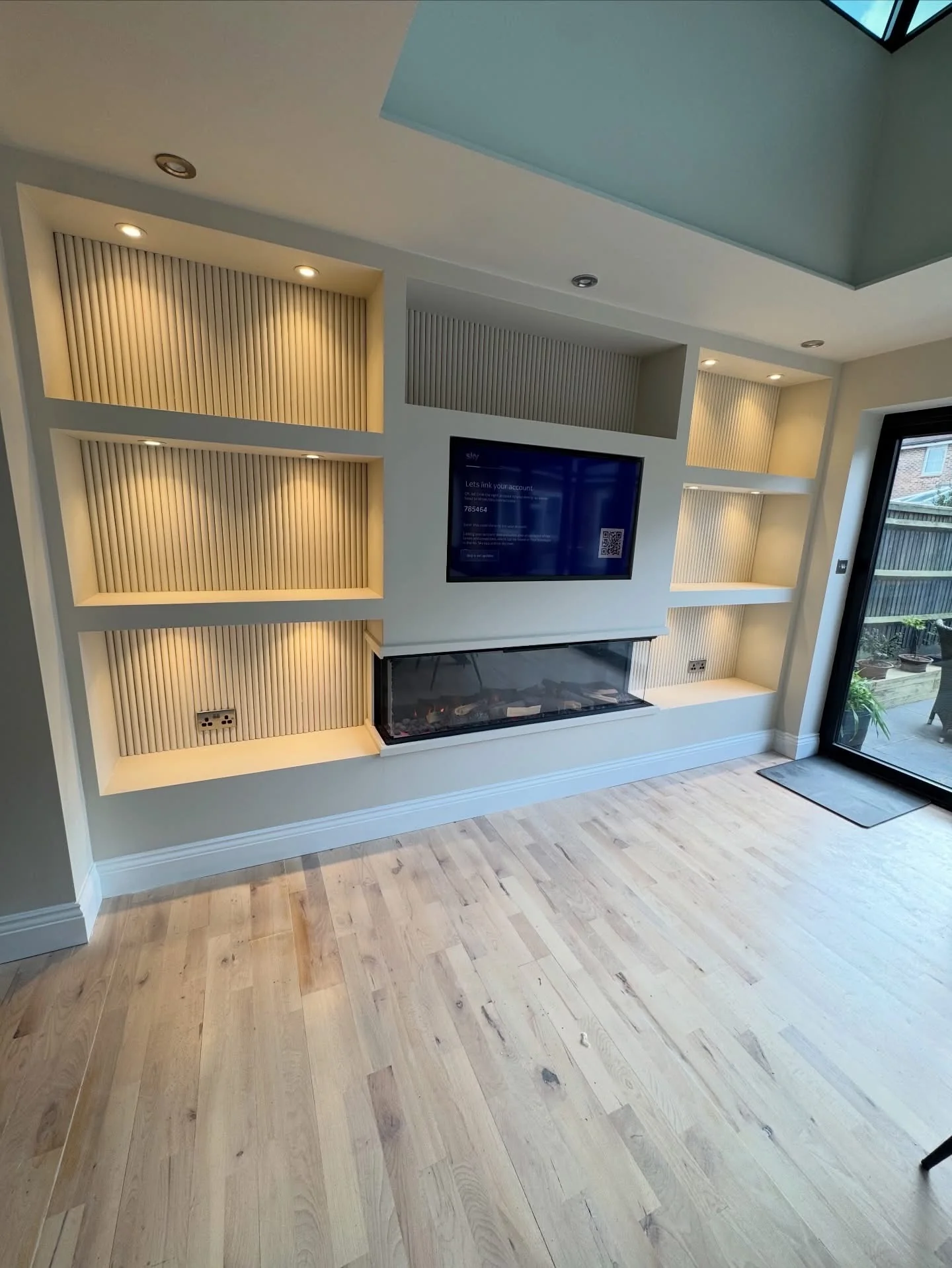 Media wall electrics by Greenwire Electrical