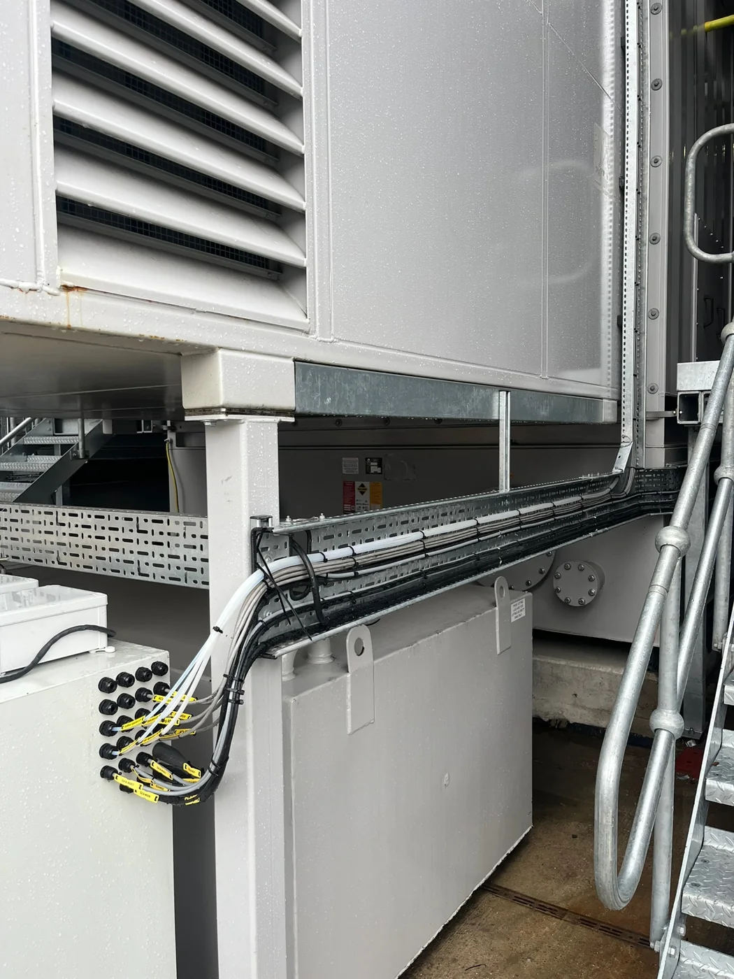 Neatly installed industrial electrical cabling and containment